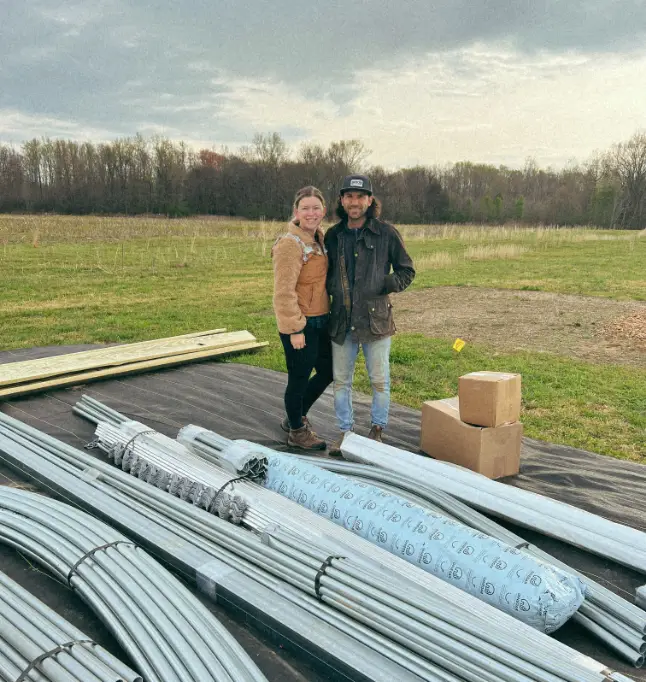 Chris and Callie receive hoophouse kit
